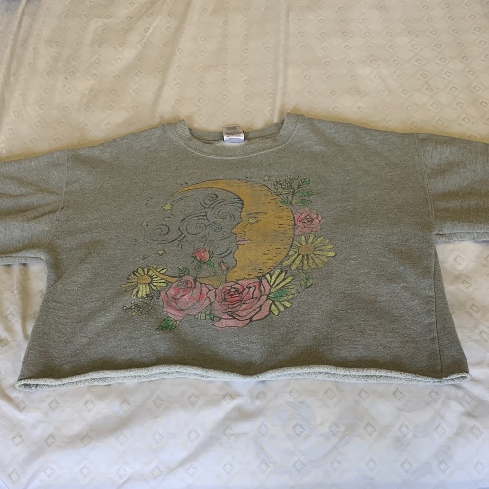I am selling a modern lux cropped sweater.